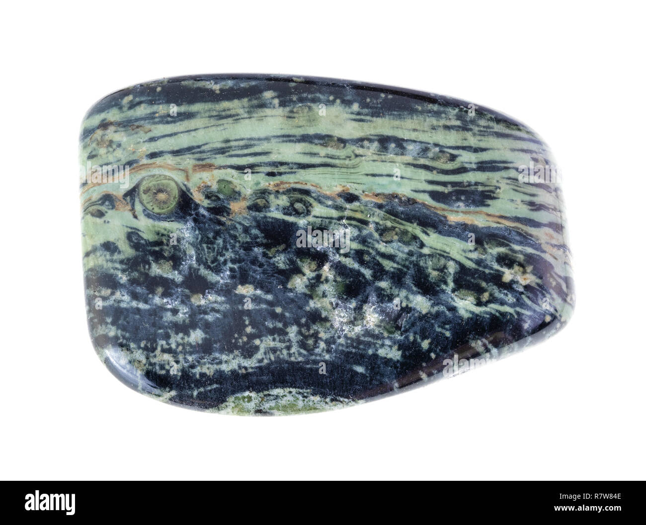 Makrofotografie von natürlichen Mineral aus geologische Sammlung - trommelsteine Rhyolith (Madagaskar Regenwald Jasper) Edelstein auf weißem Hintergrund Stockfoto