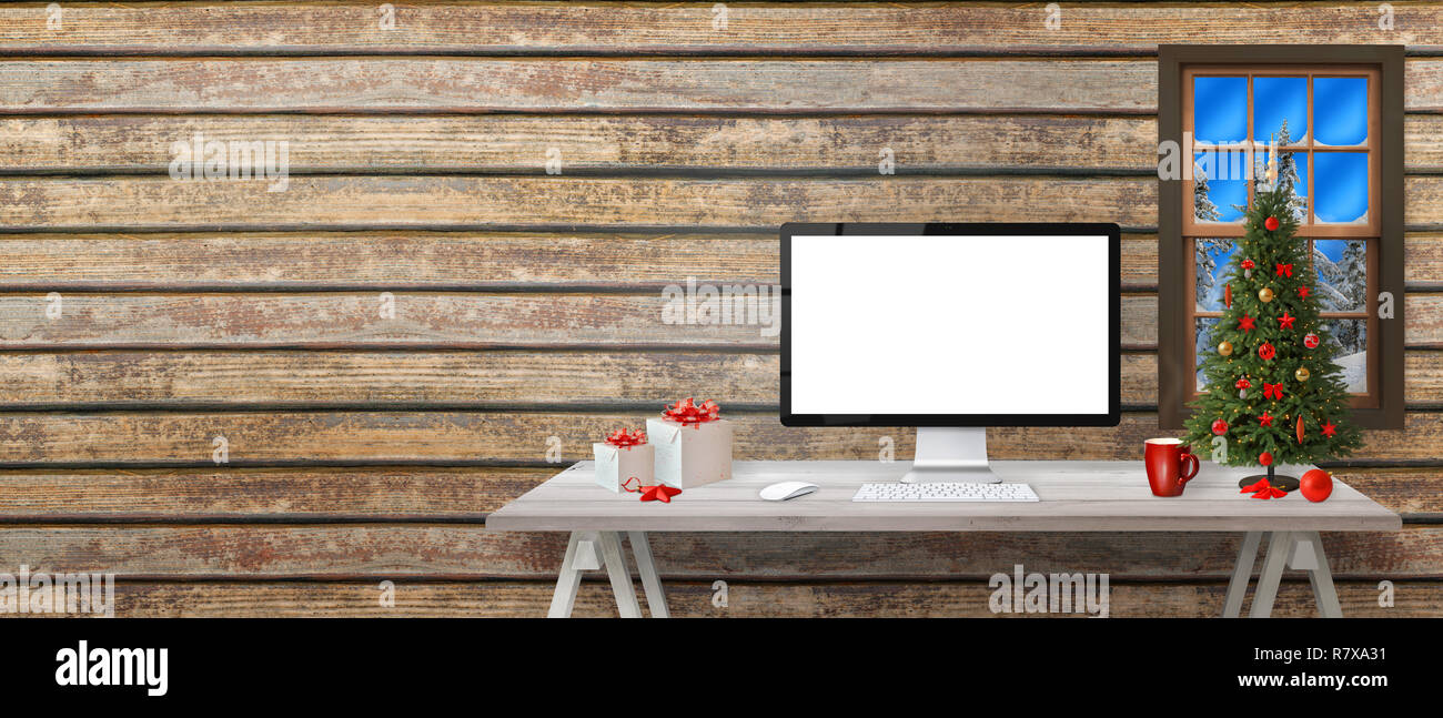 Computer Display Mockup und kopieren Platz neben. Weihnachtsbaum und Dekorationen auf weißen Holzschreibtisch. Stockfoto