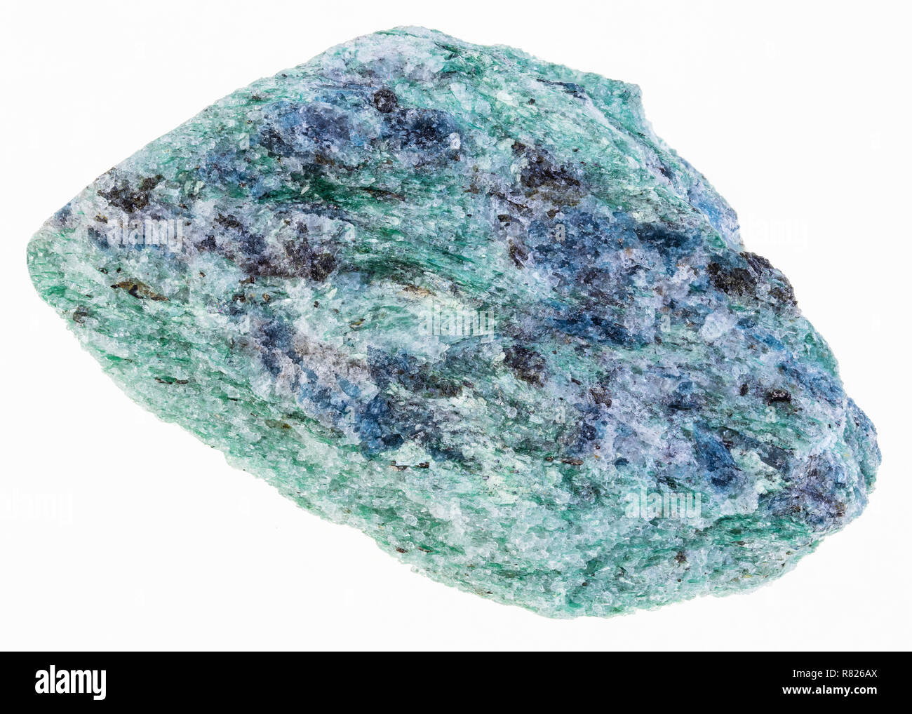 Makrofotografie von natürlichen Mineral aus geologische Sammlung - raw fuchsite (Chrom Glimmer) Stein auf weißem Hintergrund Stockfoto