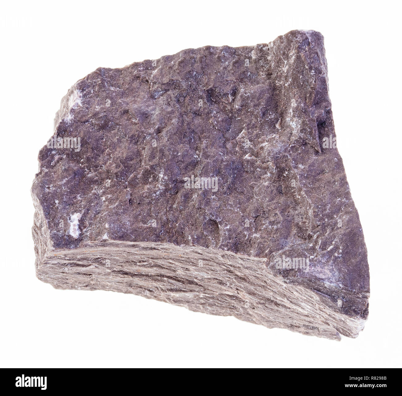 Makrofotografie von natürlichen Mineral aus geologische Sammlung - grobe Siltstone (aleurolite) Stein auf weißem Hintergrund Stockfoto