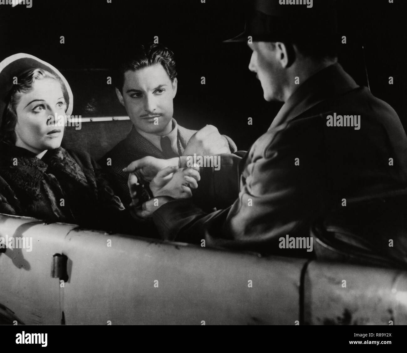 Die 39 Schritte Jahr: 1935 Großbritannien Regie: Alfred Hitchcock Robert Donat, Madeleine Carroll Stockfoto