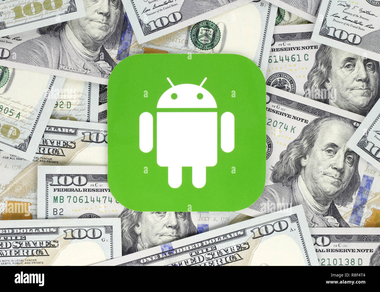 Kiew, Ukraine - September 18, 2018: Android Symbol auf Papier, ausschneiden und auf Geld Hintergrund gedruckt. Android ist ein Betriebssystem für Mobilgeräte. Stockfoto