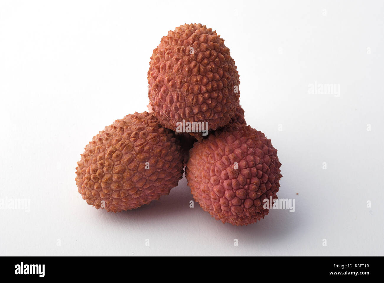 Litschis auf weißem Hintergrund Stockfoto