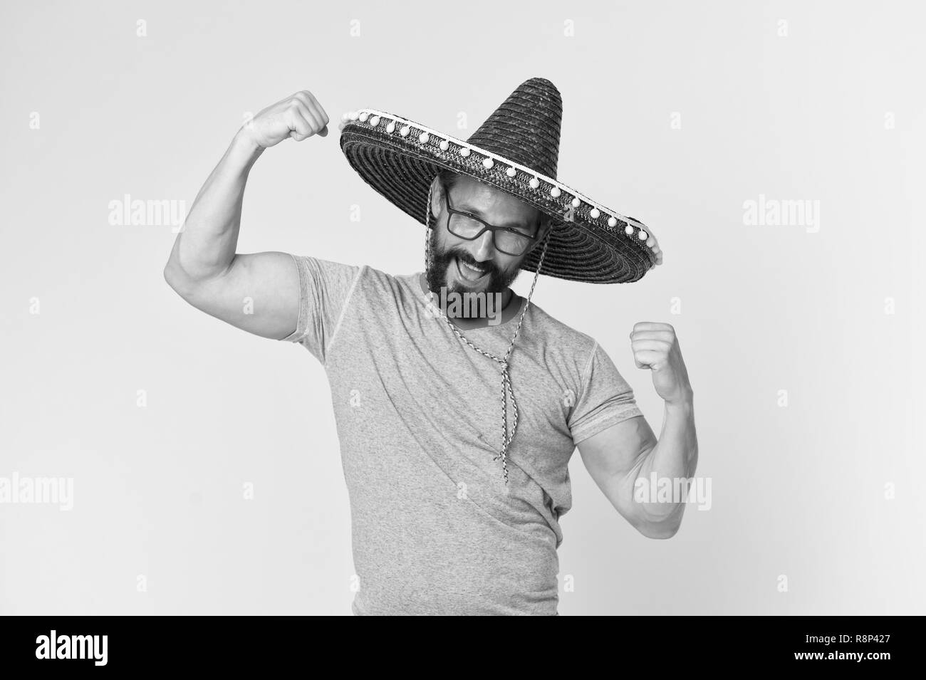 Mexikanische Konzept. Glückliche Menschen Lächeln in Mexican Hat. Mexikanische Mann in sombrero Hut. Mexikanische party Feier. Stockfoto