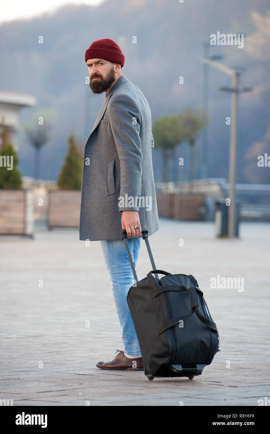 Man with travel bag deals