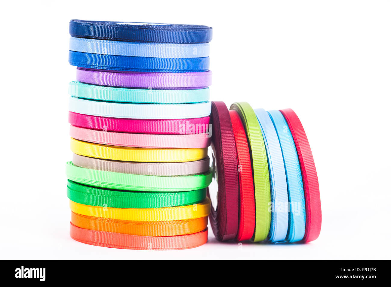 Die Bänder Spulen auf weißem Hintergrund Stockfoto