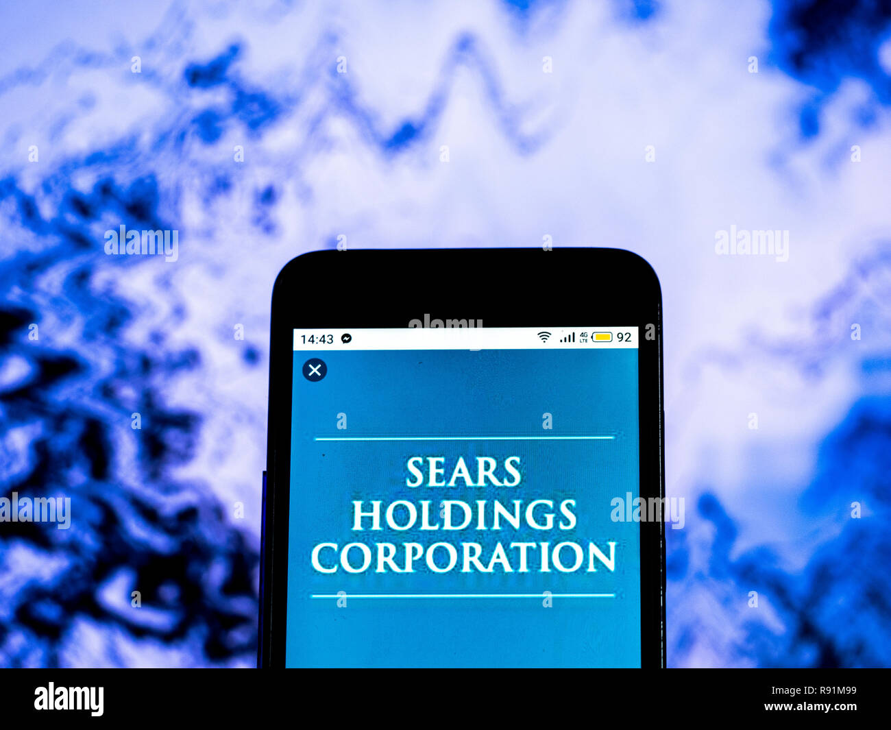 Sears Holdings Retail Firmenlogo auf dem Smartphone angezeigt Stockfoto