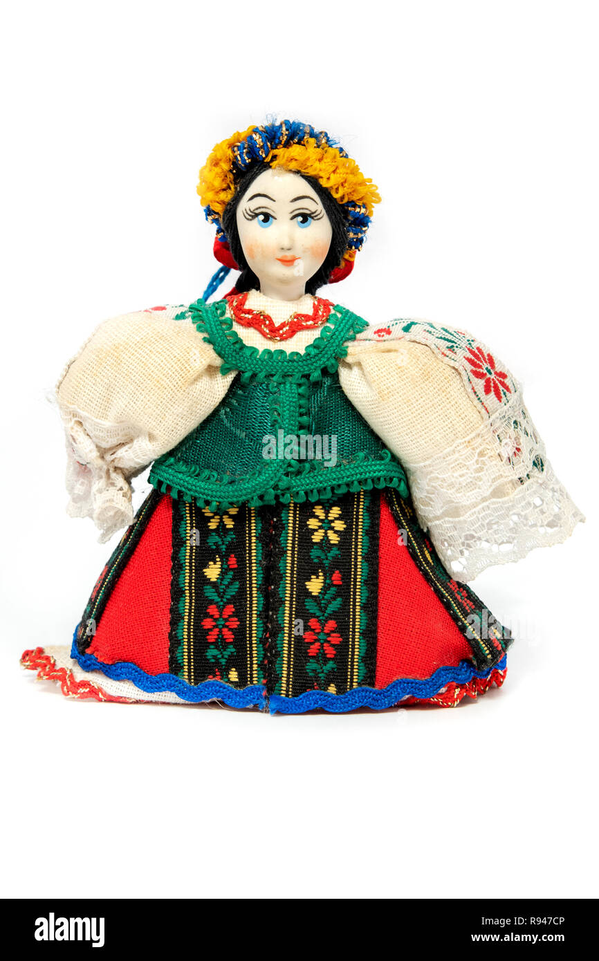 Ukrainische Puppe mit traditionellen Kleid auf weißem Hintergrund Stockfoto