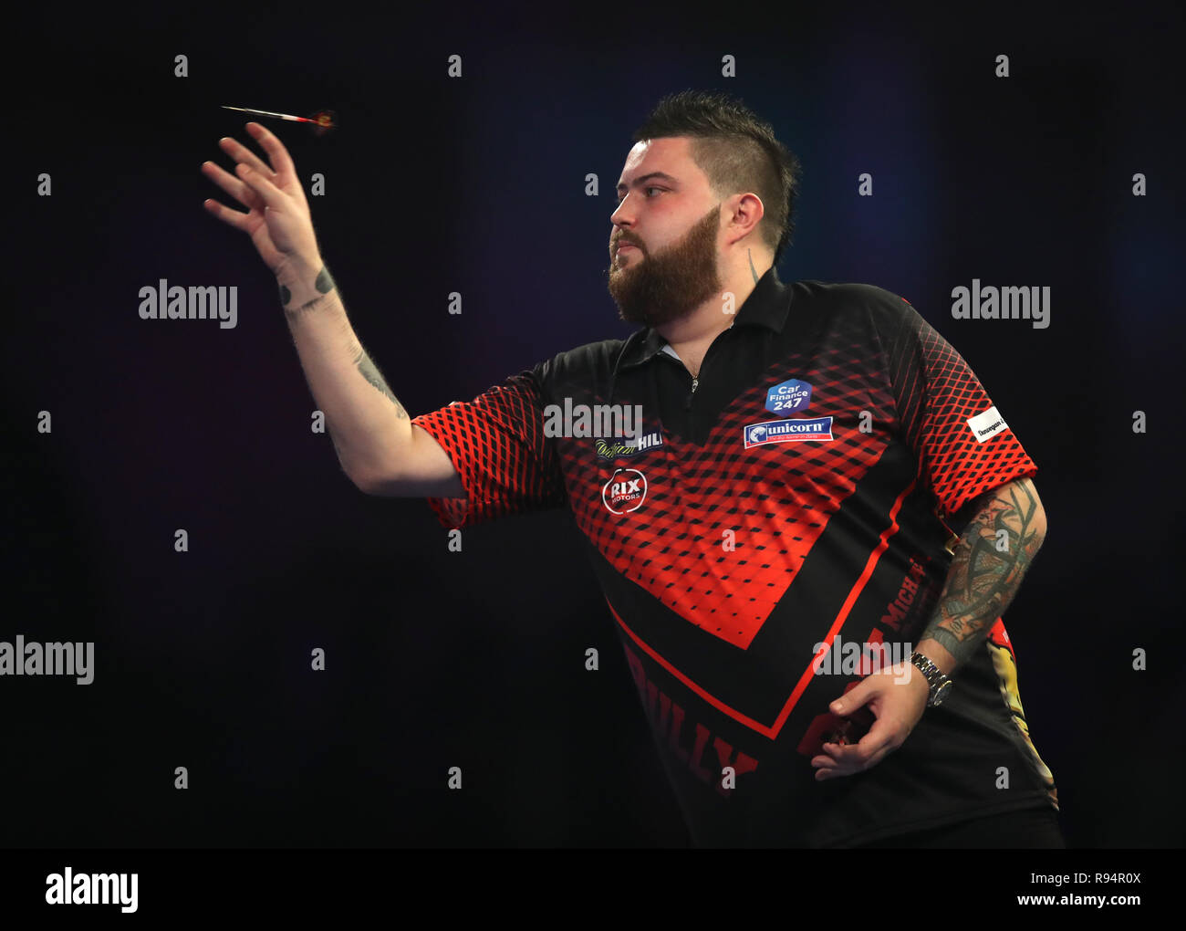 Michael Smith am Tag sieben der William Hill World Darts-WM im Alexandra Palace, London. Stockfoto