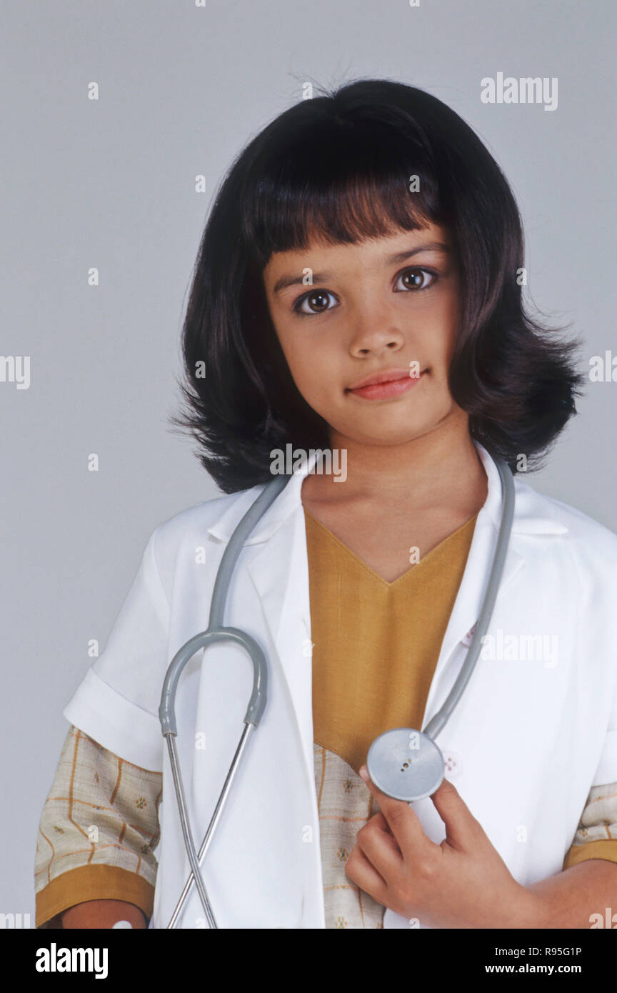 Kind in der Verkleidung von Arzt, Indien, Herrn Nr. 495 Stockfoto