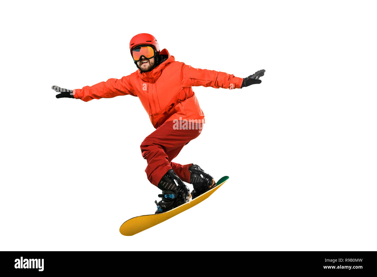Portrait des jungen Mannes in Sportkleidung mit Snowboard auf einem weißen studio Hintergrund isoliert. Der Winter, Sport, Snowboard, Snowboarder, Aktivität, extreme Konzept Stockfoto