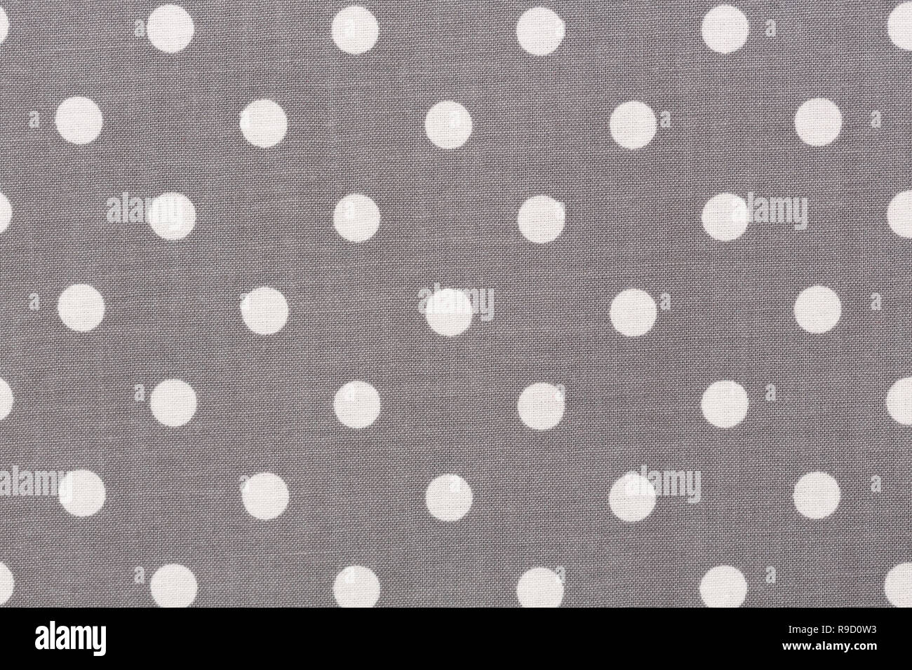 Grau Polka Dot Stoff Textur auf der Makro-, Hintergrund. Stockfoto