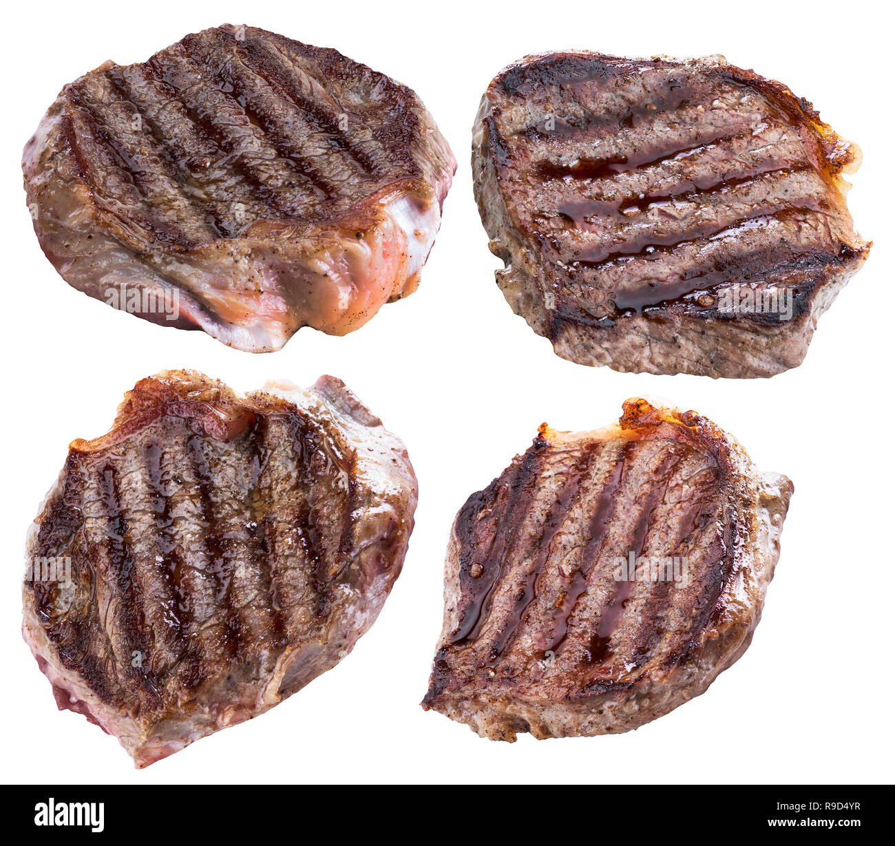 Gegrilltes Ribeye Steaks oder Rindersteaks auf weißem Hintergrund. Datei enthält Freistellungspfaden. Stockfoto