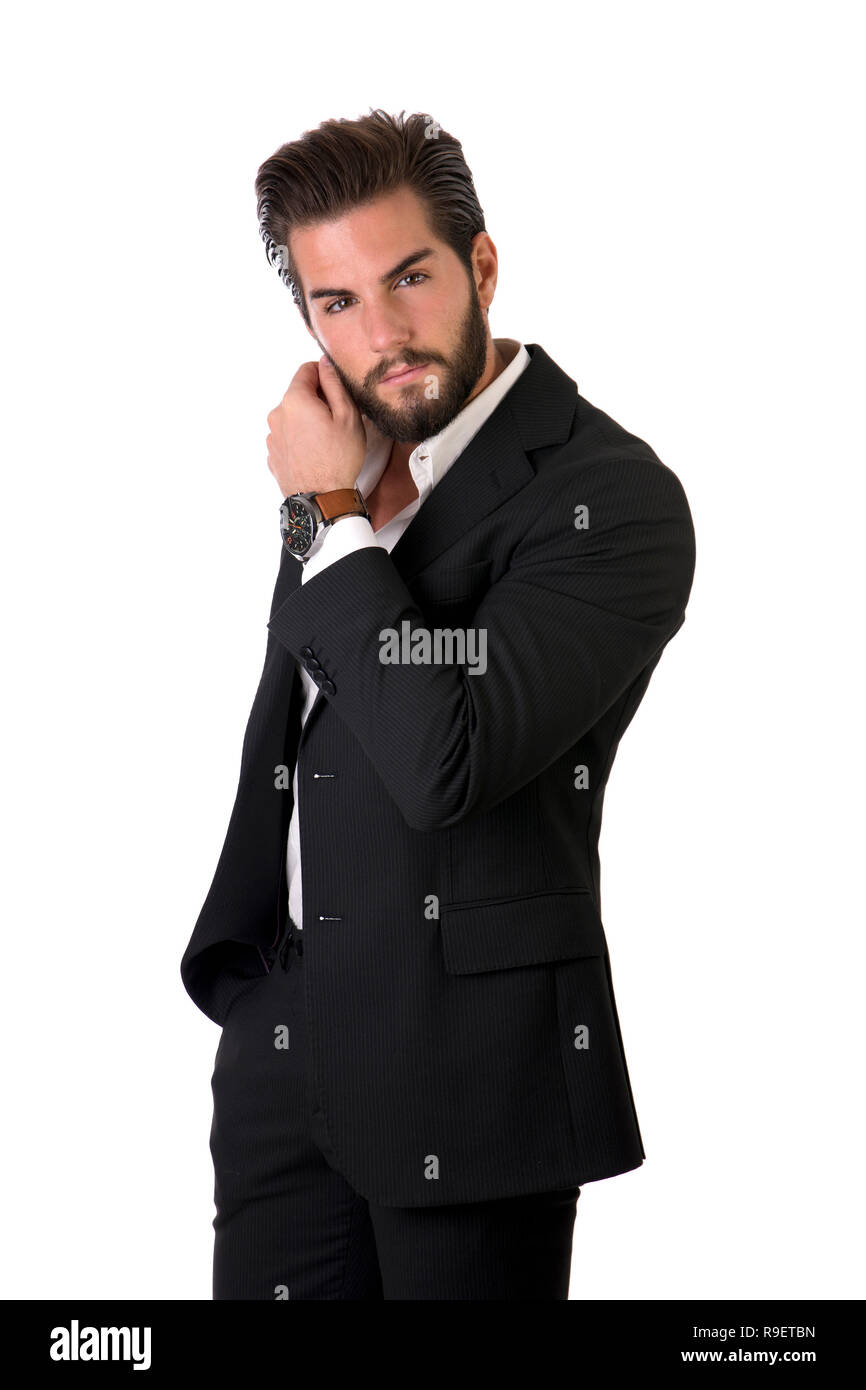 Elegante junge Mann mit Anzug im Studio Stockfoto