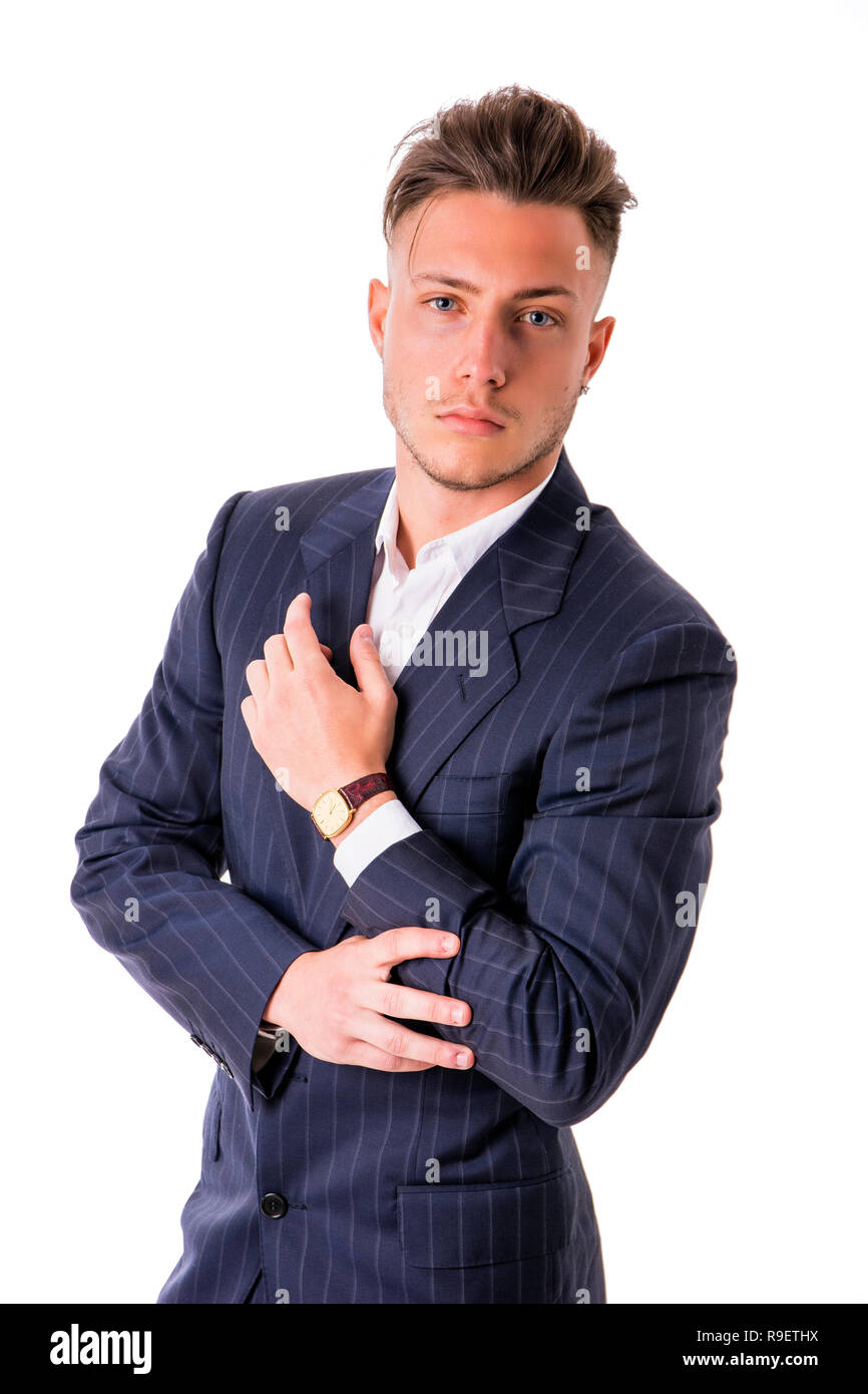 Elegante junge Mann mit Anzug im Studio Stockfoto