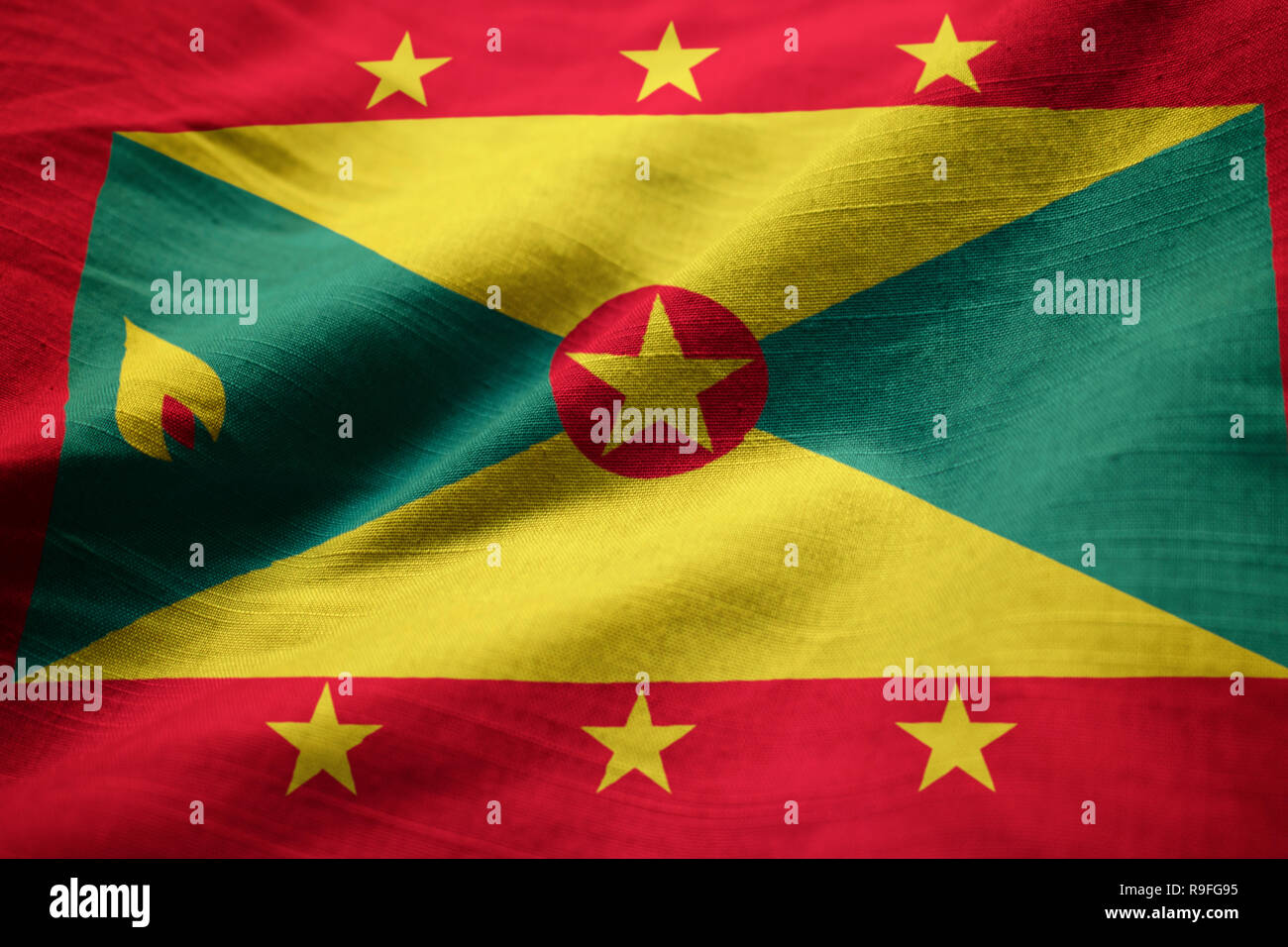 Nahaufnahme von gekräuselten Grenada Flagge Grenada Flagge weht im Wind Stockfoto