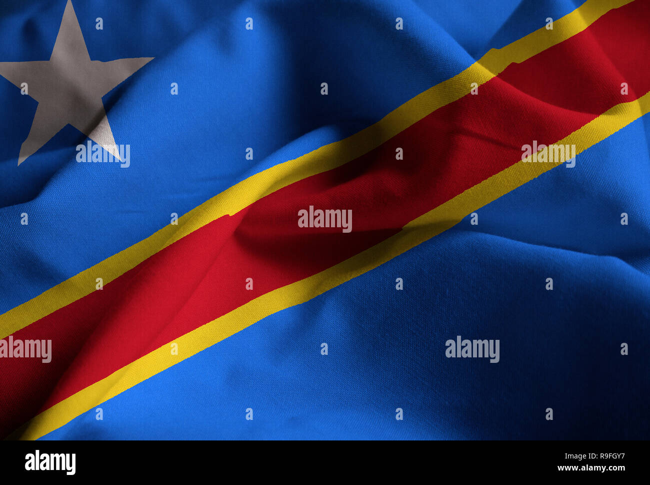 Detailansicht der gekräuselten Demokratische Republik Kongo Flagge, der Demokratischen Republik Kongo Flagge weht im Wind Stockfoto