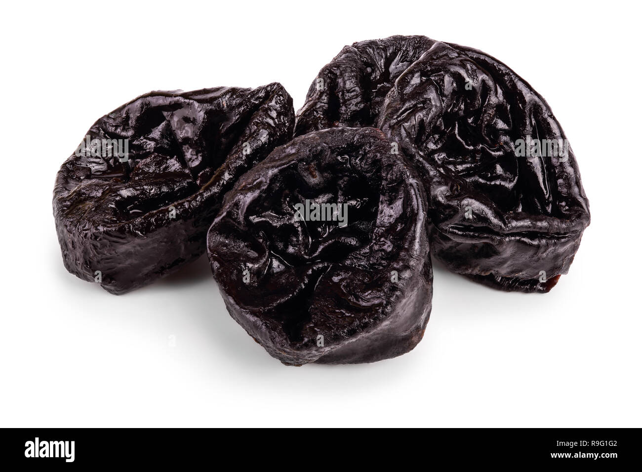 Getrockneten Pflaumen - Pflaumen auf einem weißen Hintergrund. Stockfoto
