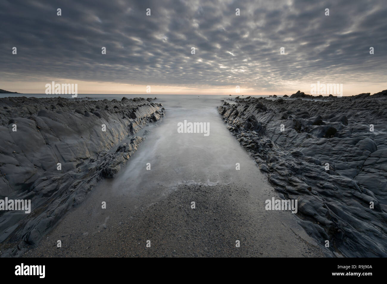 Welcombe Strand; Sonnenuntergang; Devon, Großbritannien Stockfoto