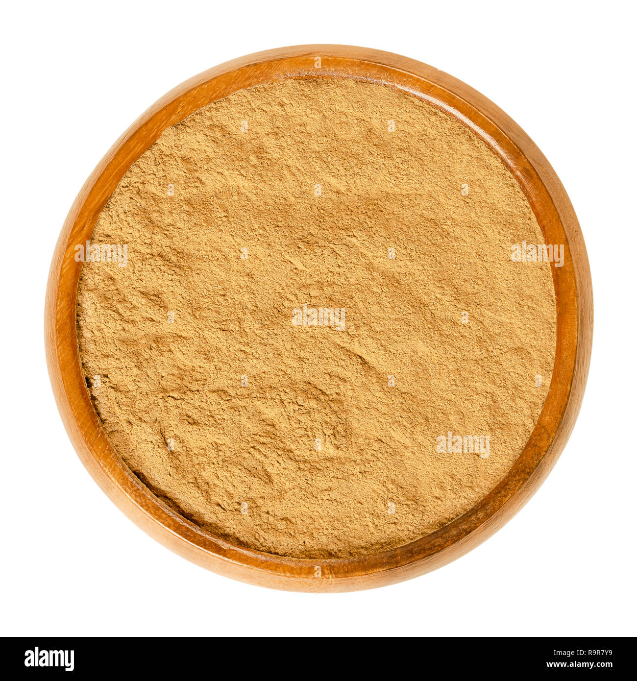 Zimtpulver in Houten. Aus der inneren Rinde des Zimtbaumes Gewürz Ceylon, Cinnamomum verum. Braun aromatische Würze und Aroma Zusatzstoff. Stockfoto