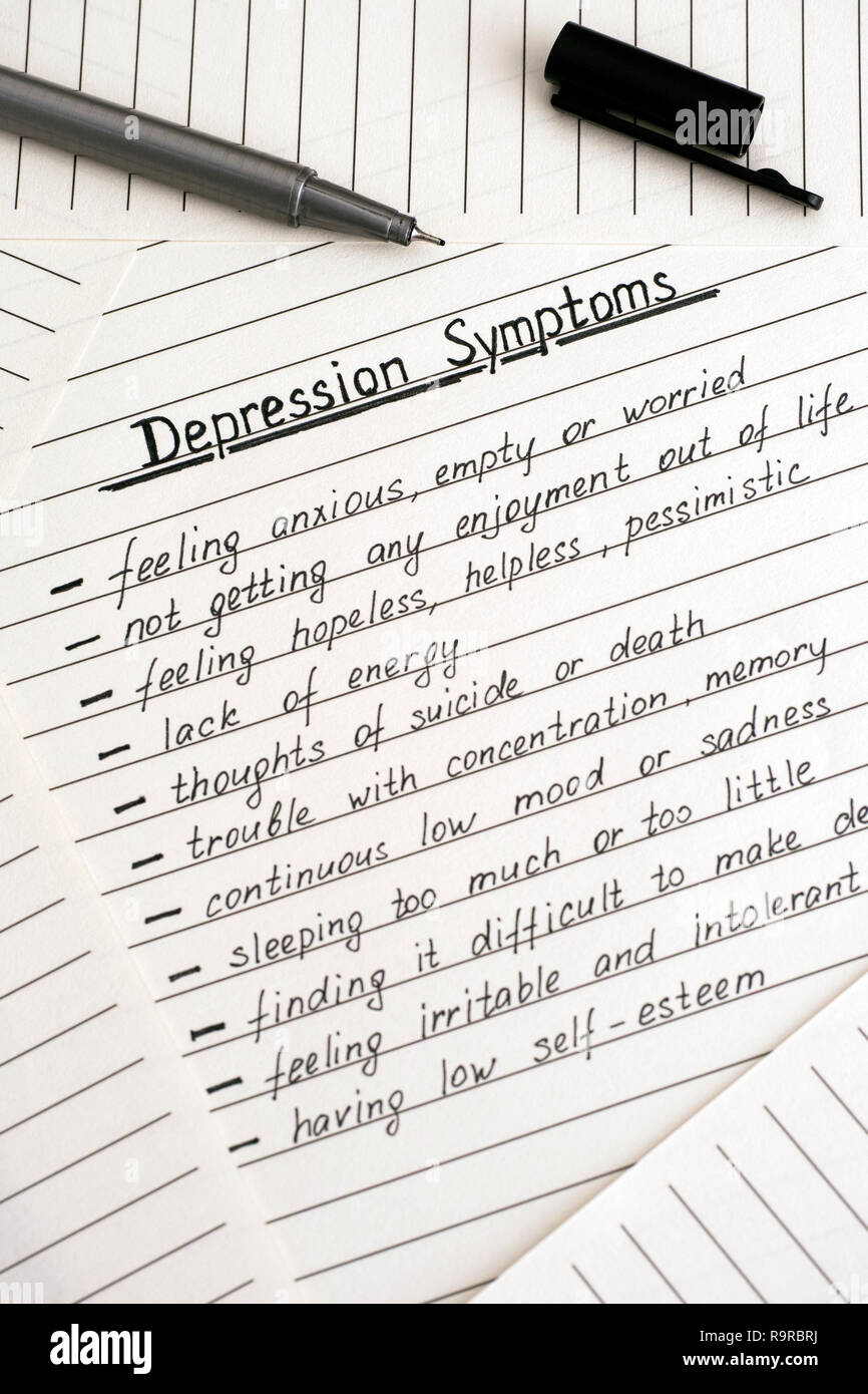 Depression Symptome schreiben auf der Liste und schwarze Stift. Close-up. Stockfoto