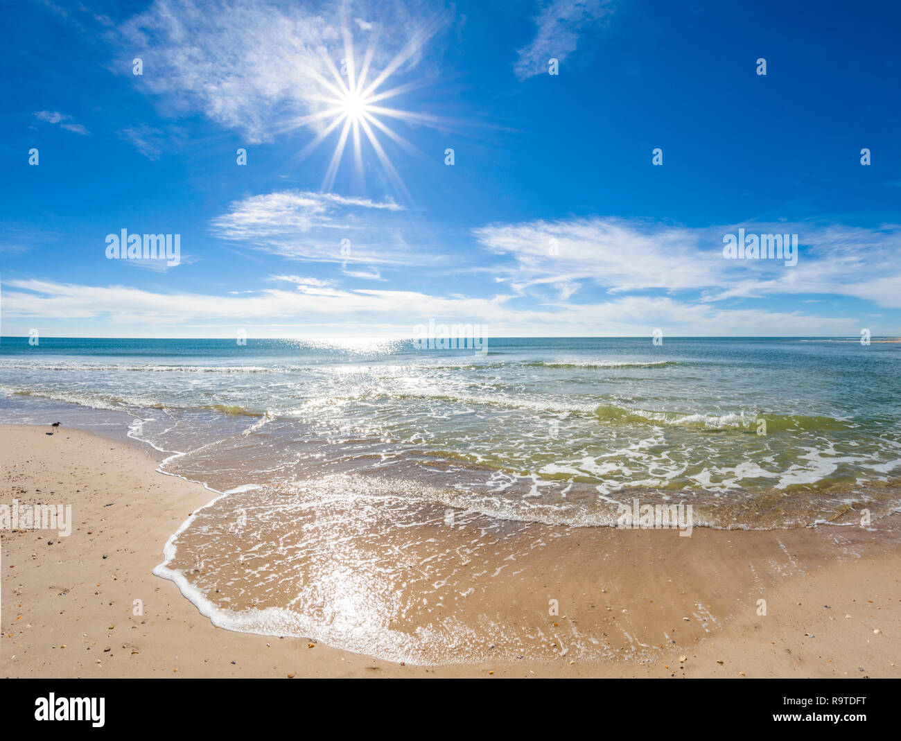 Sunburst an einem sonnigen Tag über den Golf von Mexiko auf St George Island im pfannenstiel oder vergessene Küste von Florida in den Vereinigten Staaten Stockfoto