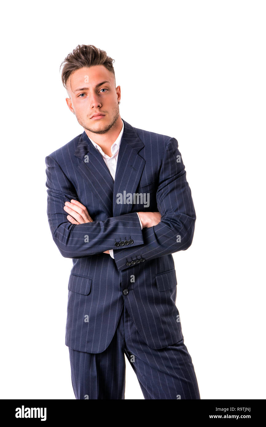 Elegante junge Mann mit Anzug im Studio Stockfoto
