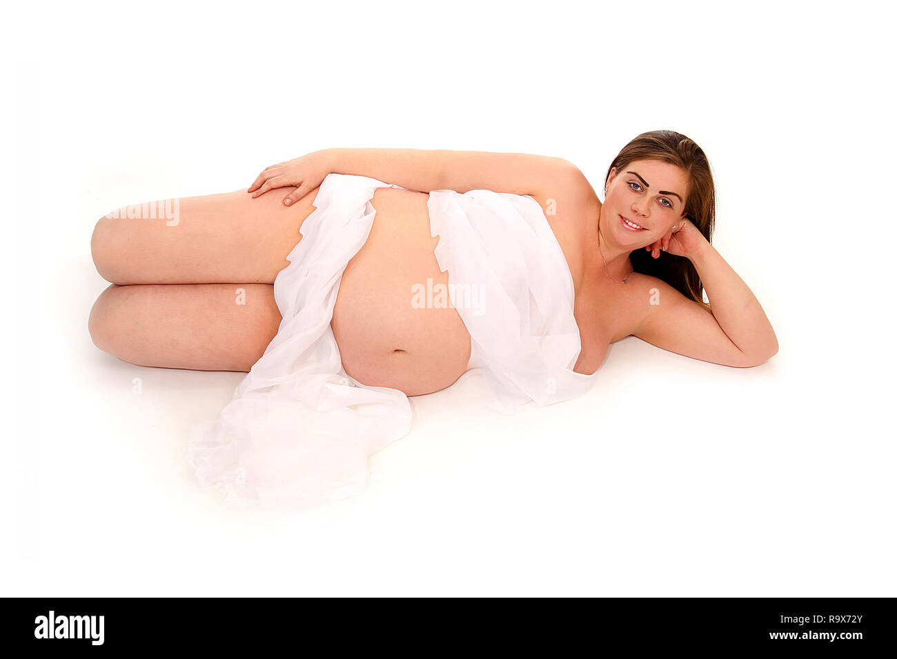Mutterschaft, Babybauch, Mama zu Entspannung auf Ihrer Seite, Stockfoto