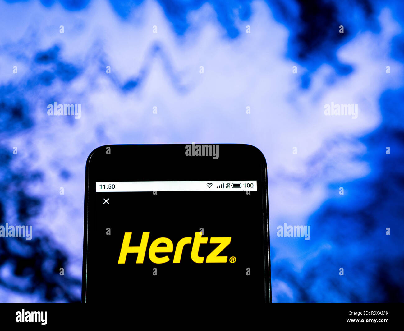 Hertz Global Holdings Inc. Logo auf dem Smartphone angezeigt Stockfoto