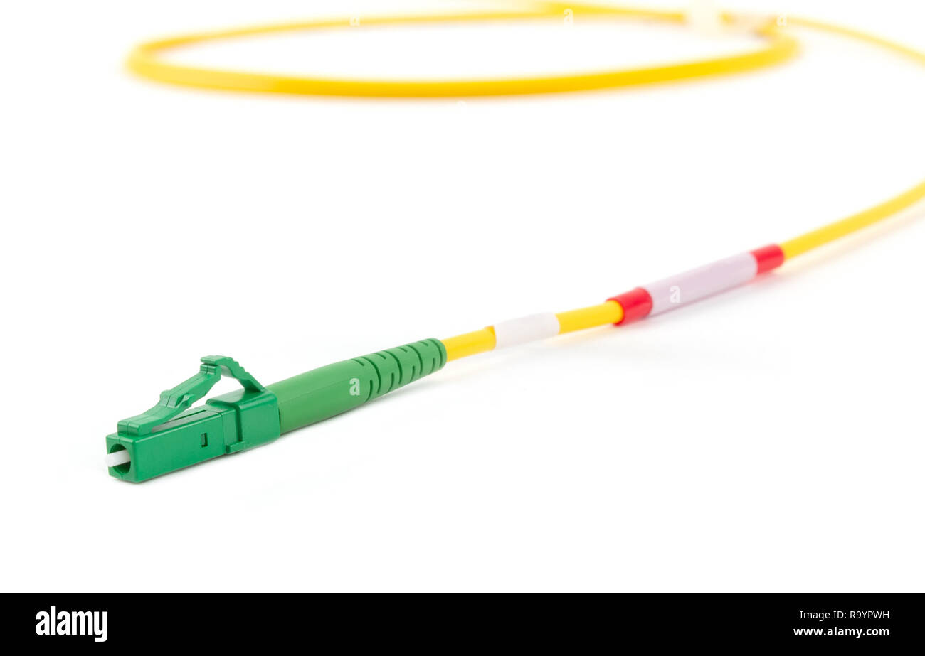 Lwl-Single Modus small form factor LC Patchkabel Jumper mit grüner Stecker auf weißem Hintergrund Stockfoto