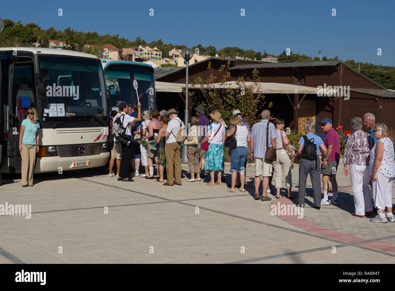 Touristische Queuing, Trainer. Griechische Inseln. Stockfoto