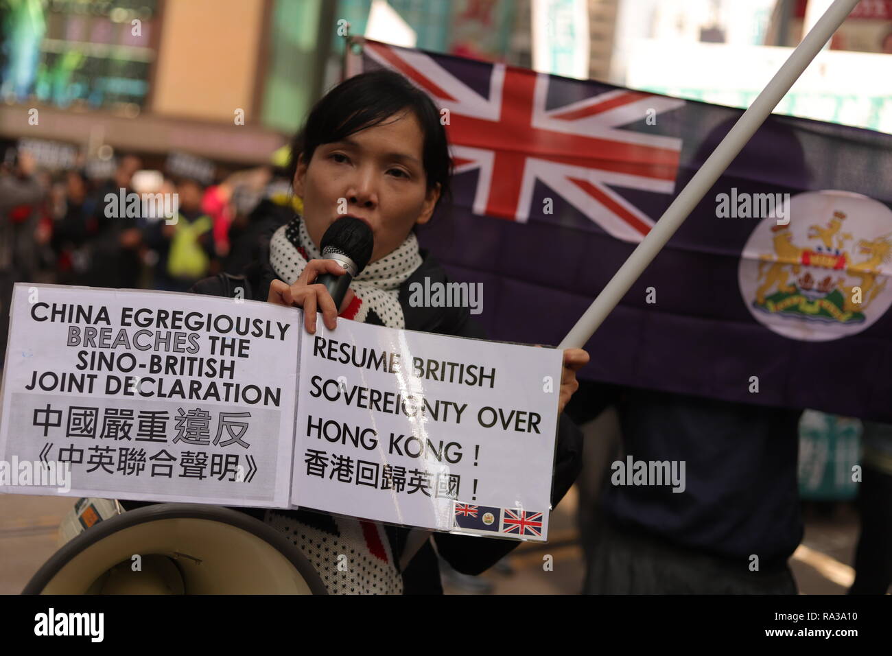 Hongkong, China. 1 Jan, 2019. Pro-Hong Kong Unabhängigkeit Aktivist Anzeige eines Banners aufrufen Für Hongkongs Unabhängigkeit während der jährlichen TAG DES NEUEN JAHRES MÄRZ organisiert von pro-demokratischen politischen Lager. Jan-1, 2019 Hong Kong. ZUMA/Liau Chung-ren Credit: Liau Chung-ren/ZUMA Draht/Alamy leben Nachrichten Stockfoto