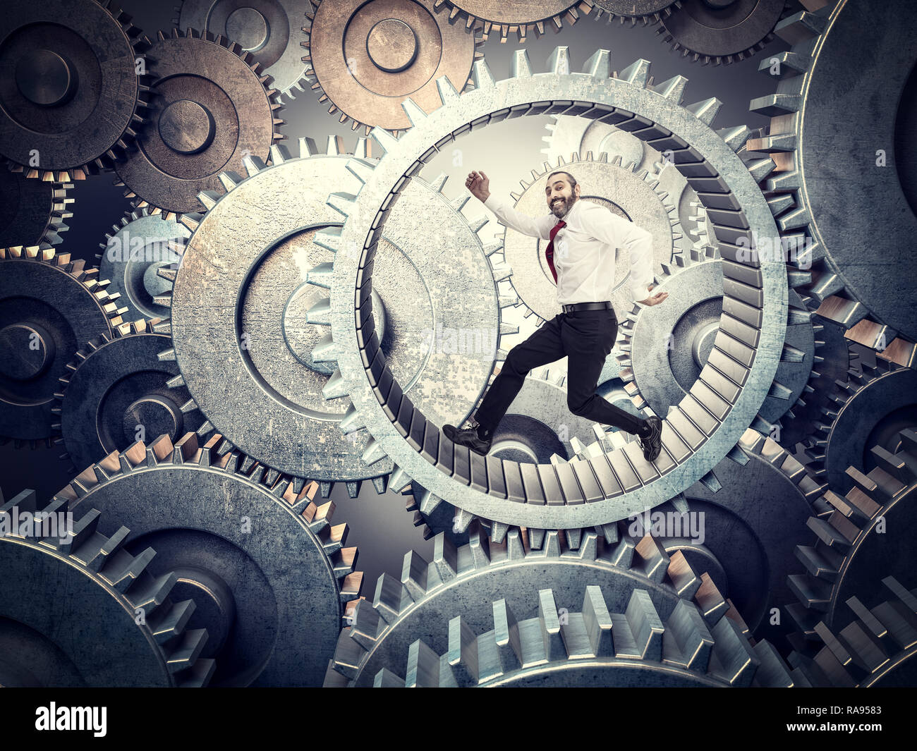 Ausführen von Geschäftsmann in riesigen abstrakten Gang Stockfoto