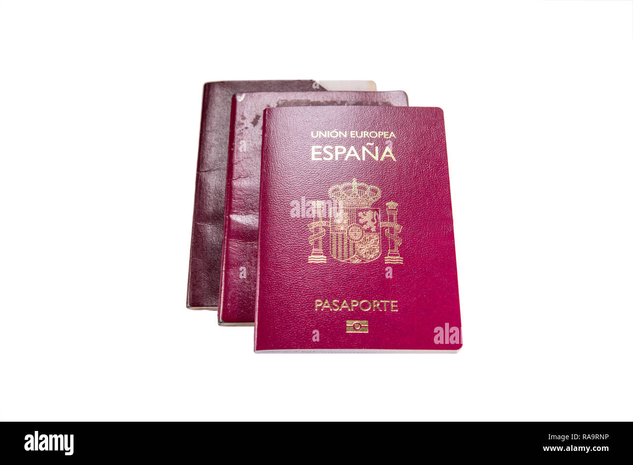 Neuen spanischen Pass über die alten abgelaufen sind und weißem Hintergrund Stockfoto