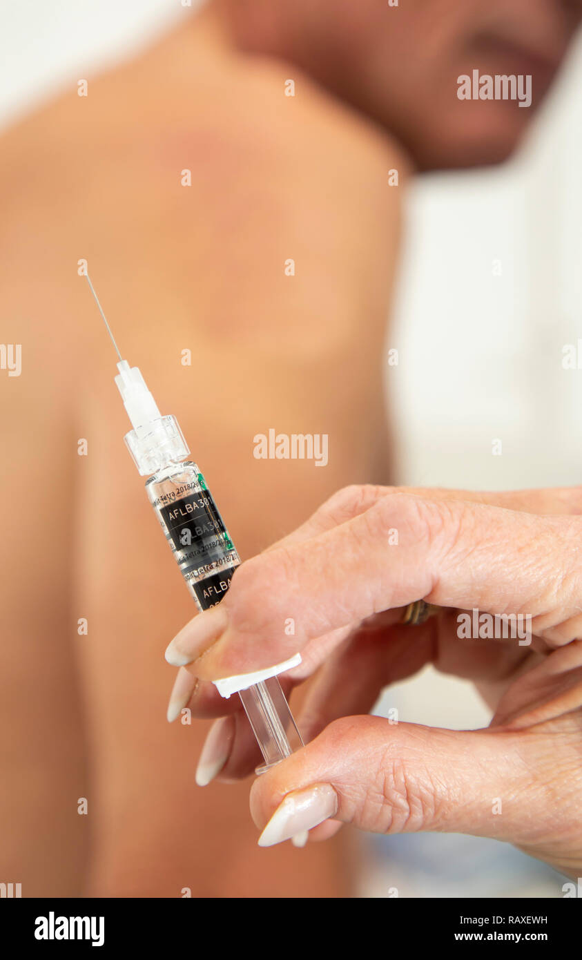 Eine Arztpraxis, Impfpass, Grippe schutz Impfung, Stockfoto