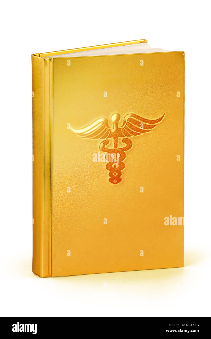 Eine goldene Cover hardcover Medizin Buch auf Weiß - mit Freistellungspfad Stockfoto