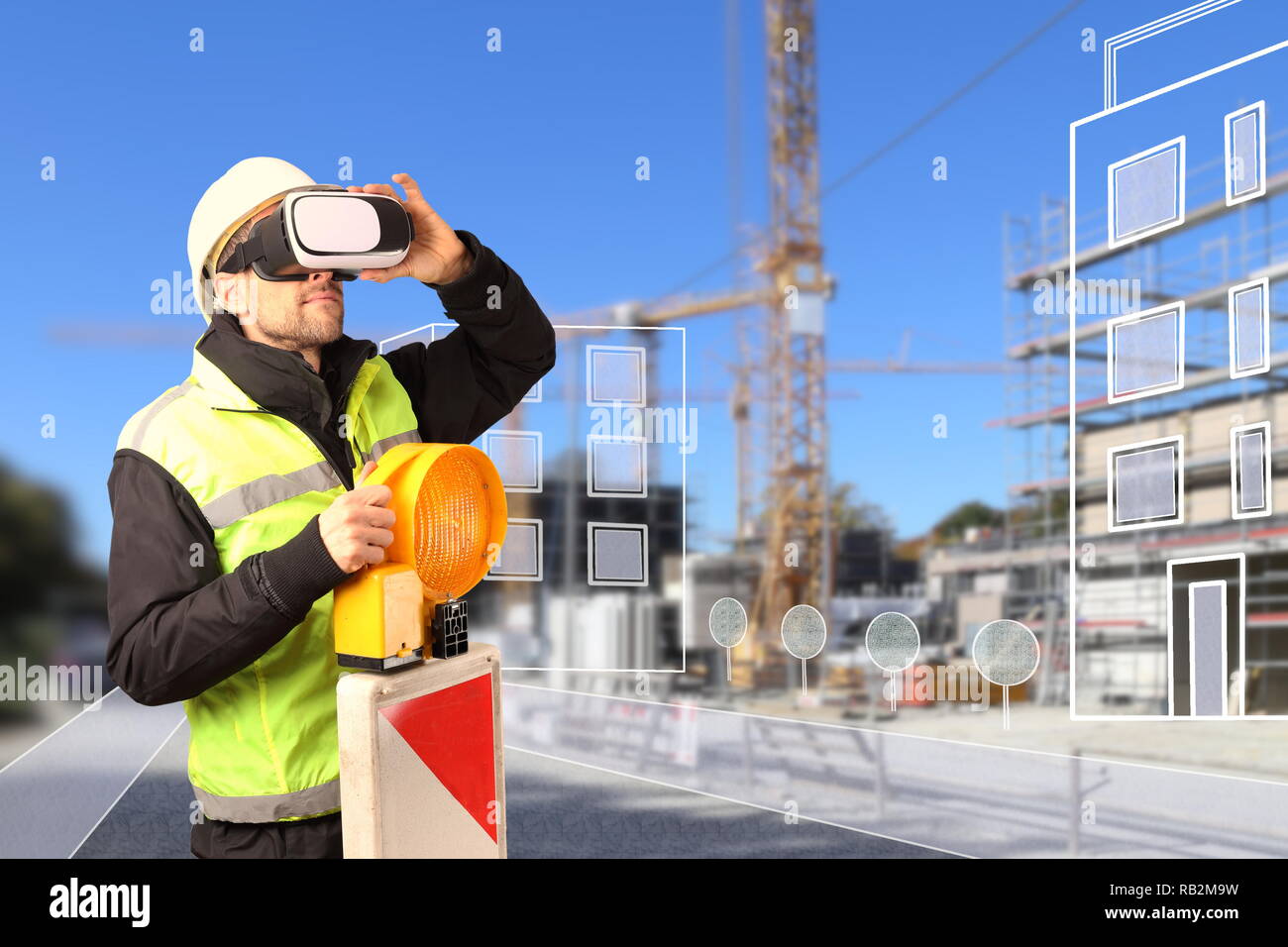 Ein Arbeiter auf der Baustelle mit VR-Brille smart City Stockfoto