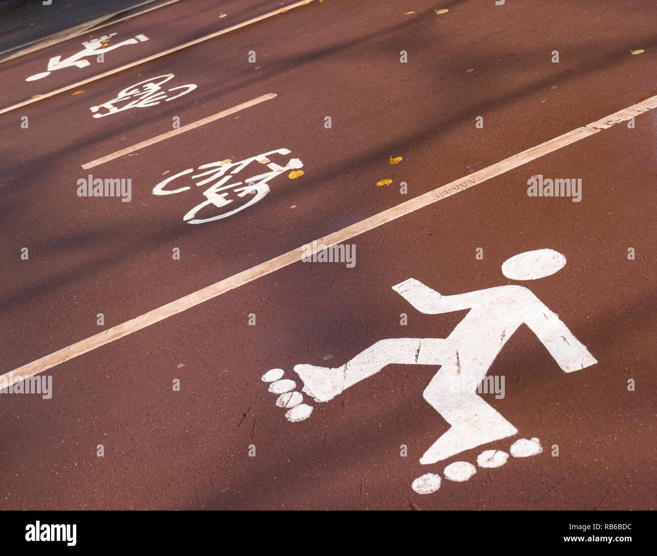 Joggen Fahrrad- und rollersat das Stadion Stockfoto