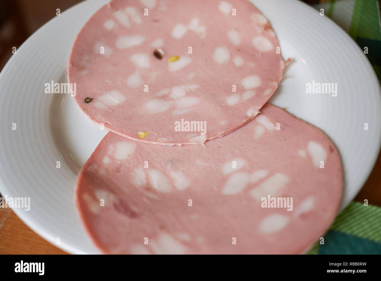 Breakfast plate with mortadella Fotos und Bildmaterial in hoher