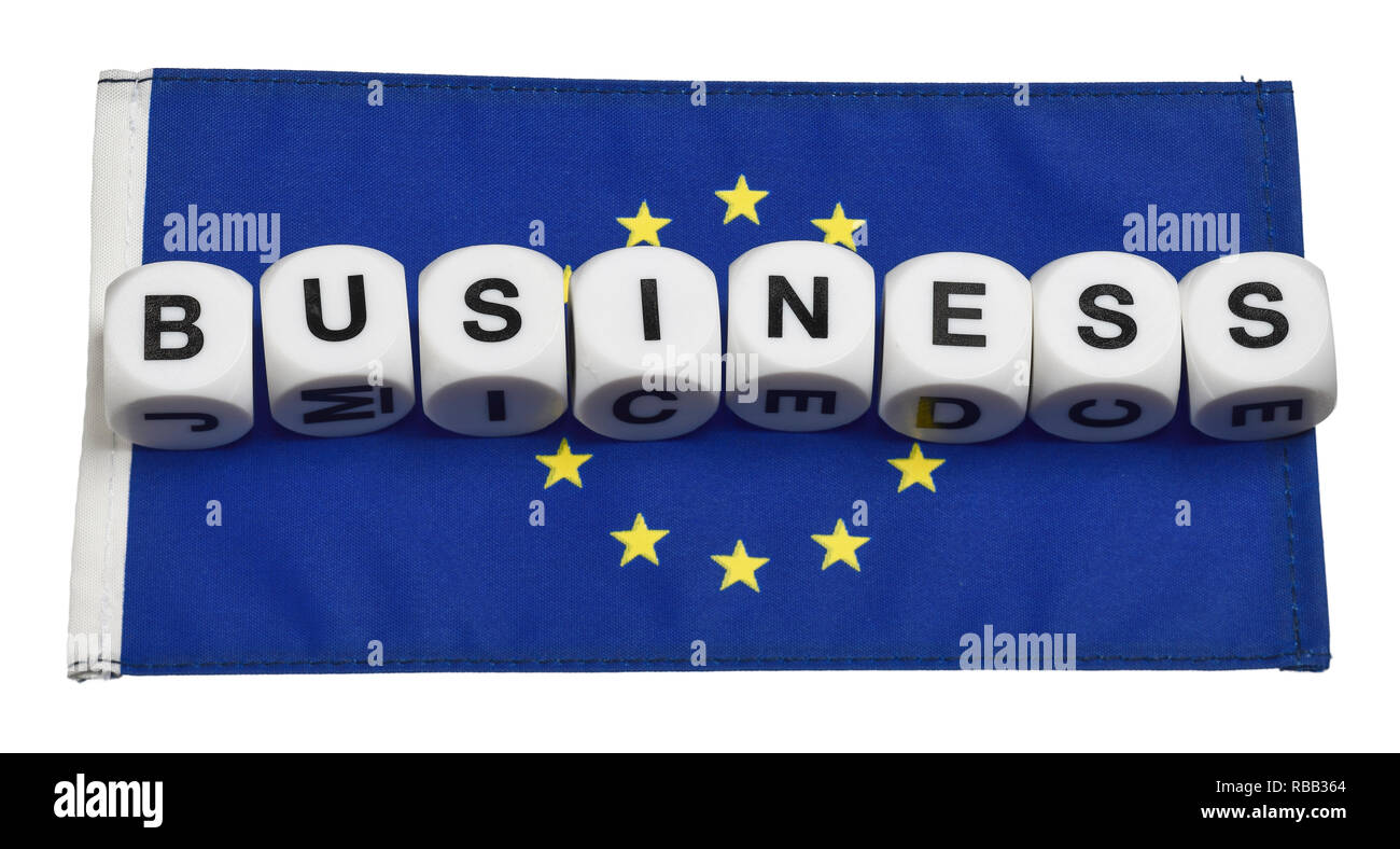 Das Wort, das Geschäft, das auf einer Fahne der Europäischen Union buchstabiert Stockfoto