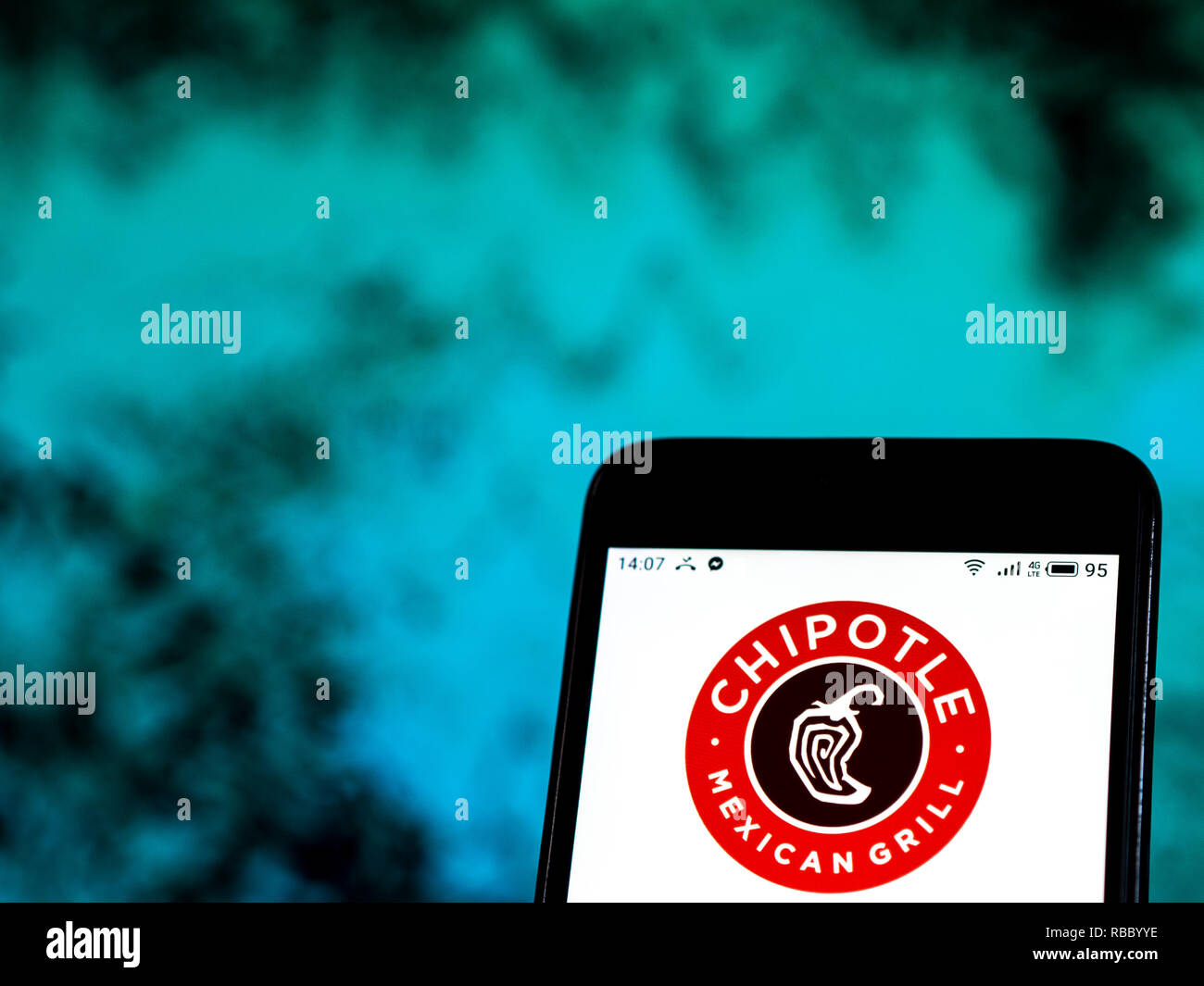 Chipotle Mexican Grill Restaurant Firmenlogo auf dem Smartphone angezeigt. Stockfoto