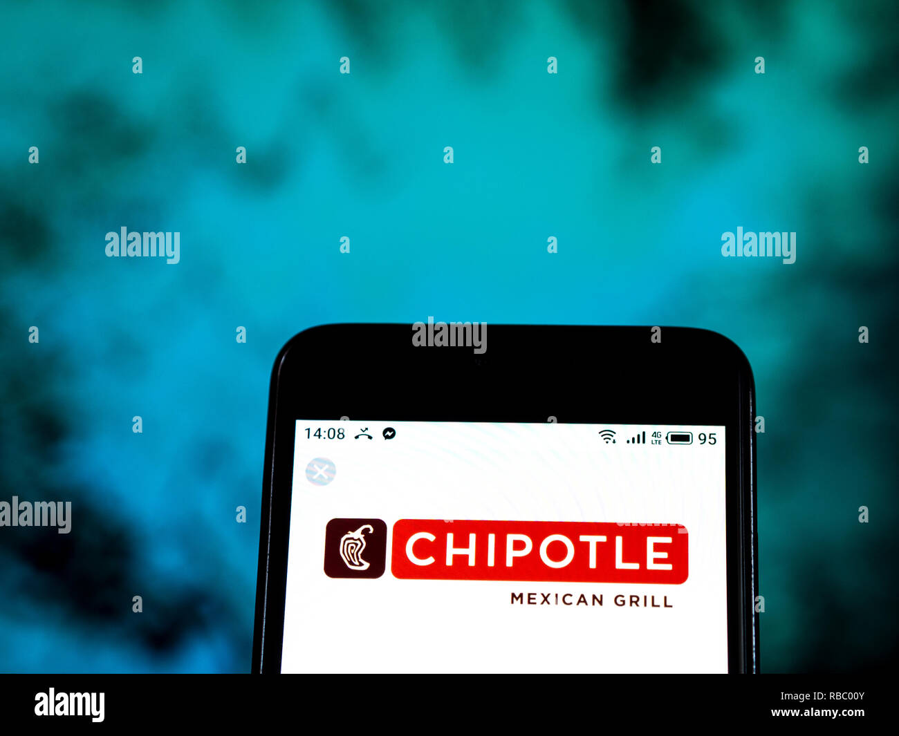 Chipotle Mexican Grill Restaurant Firmenlogo auf dem Smartphone angezeigt. Stockfoto