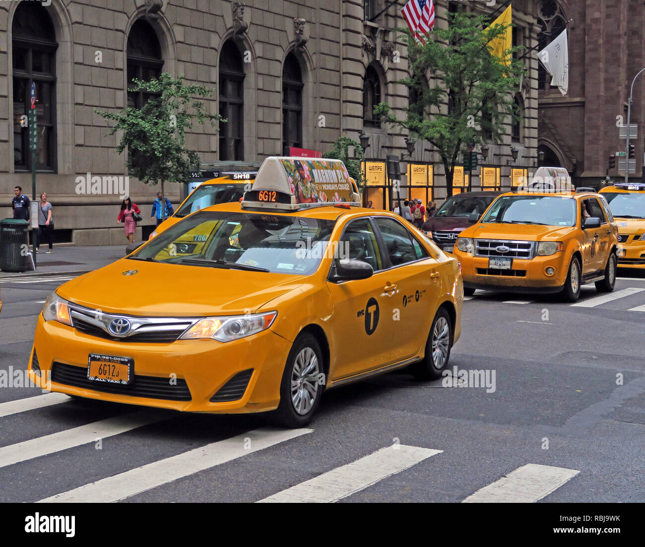 Canary Yellow Medaillon New York Taxi, Mietwagen, Manhattan, New York City, NY, USA Stockfoto