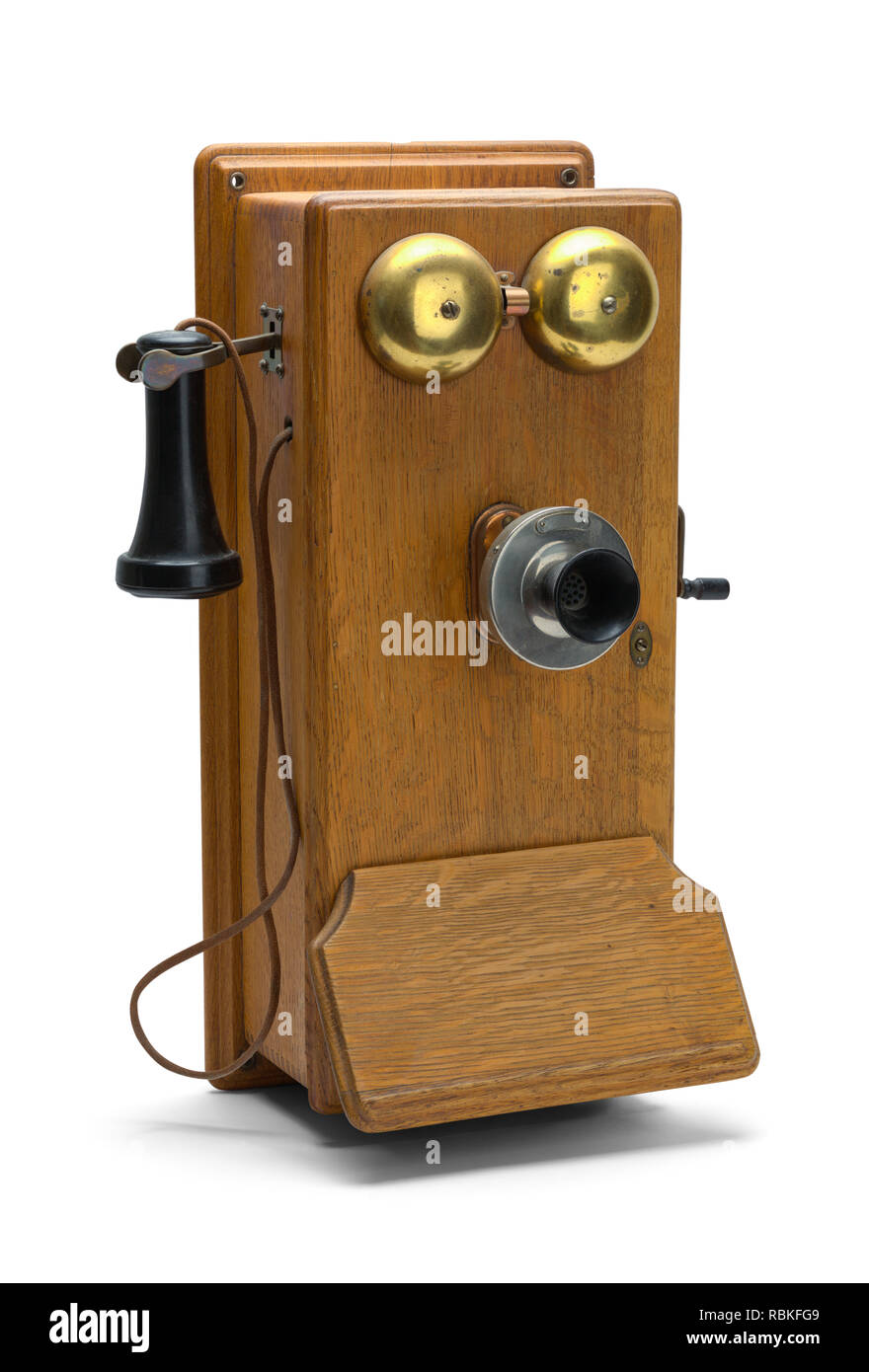 Altes holz Ring Telefon isoliert auf einem weißen Hintergrund. Stockfoto