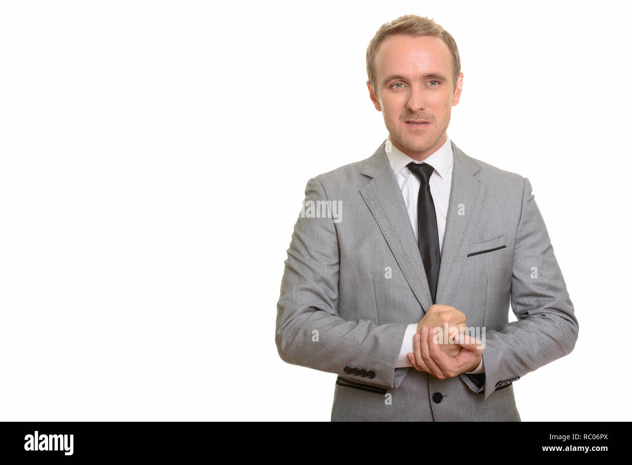 Stattlichen kaukasischen Geschäftsmann geben Motivation vor weißem Hintergrund Stockfoto