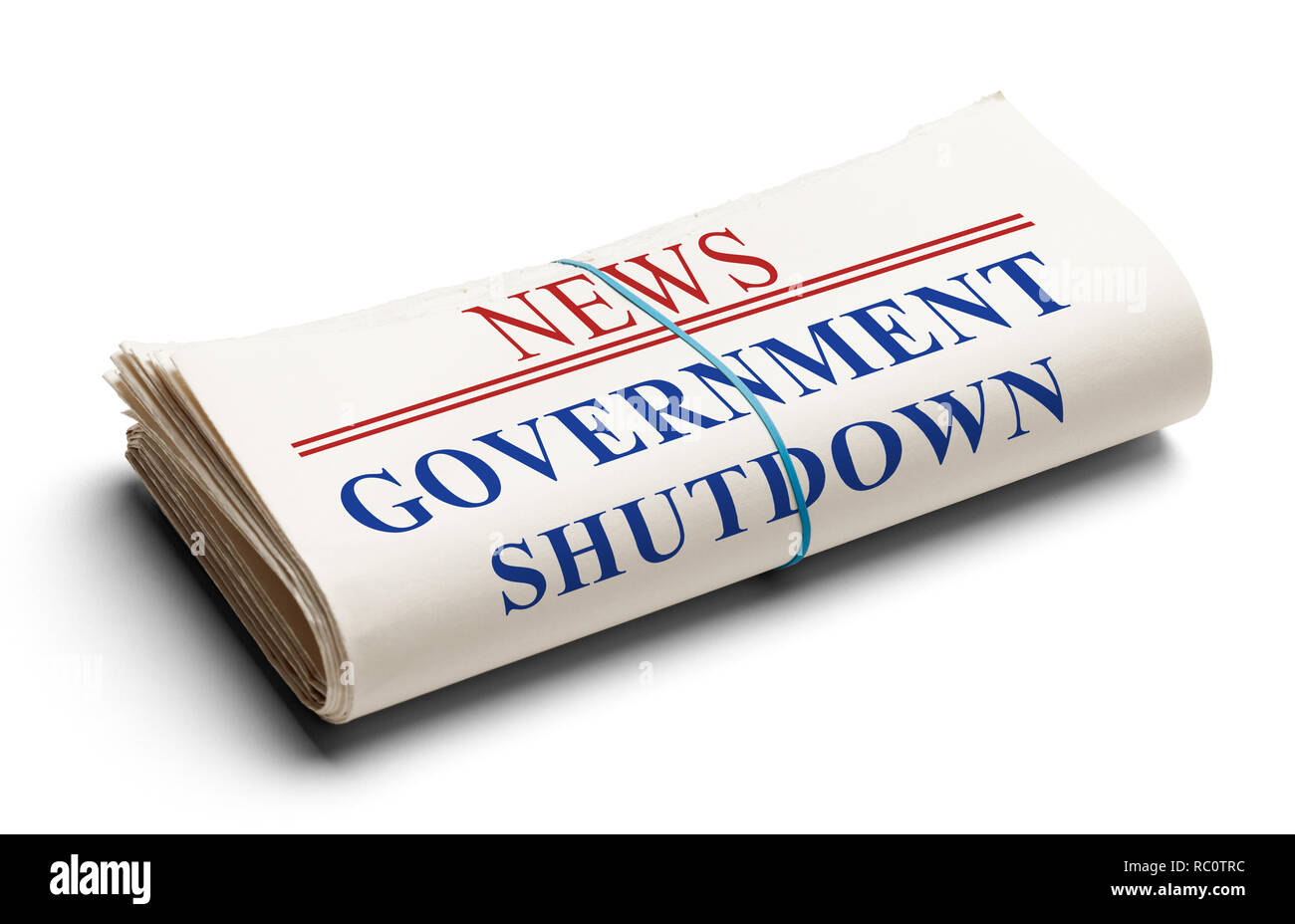 Gefaltete Zeitung mit der Schlagzeile Government Shutdown isoliert auf Weiss. Stockfoto