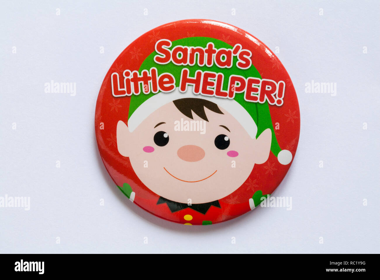 Santa's Little Helper rote runde Abzeichen, pin Badge, auf weissem Hintergrund - Für das Tragen an Weihnachten Stockfoto