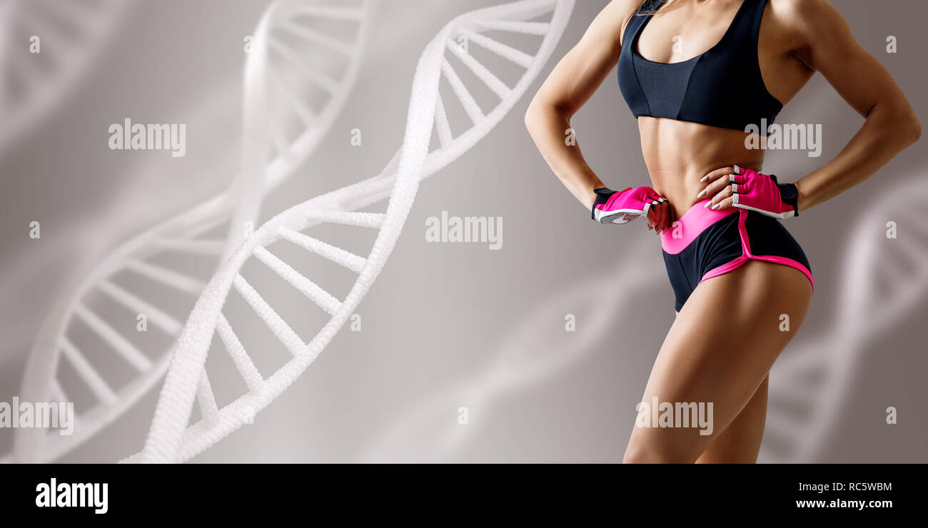Athletic fitness Frau ansehen unter DNA-Ketten. Stockfoto