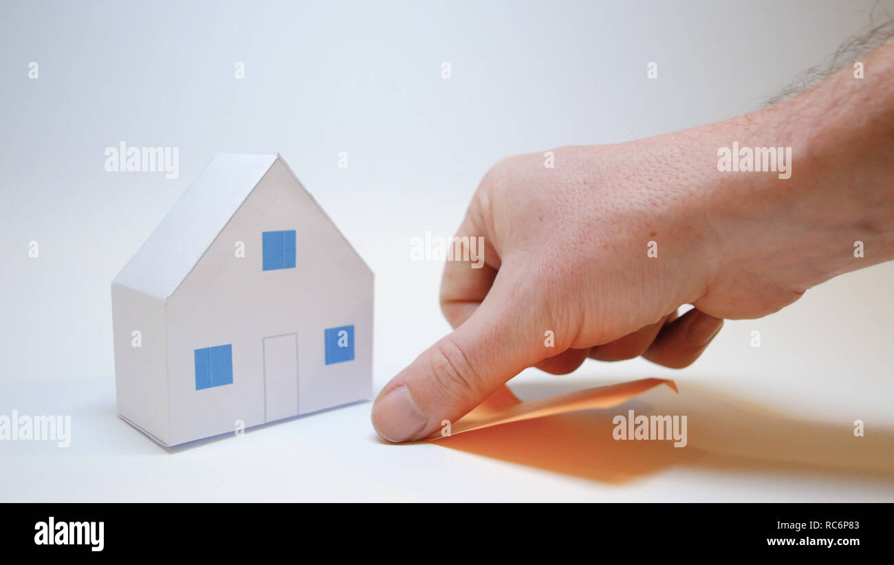 Hand Ruht Neben Einem Papier Haus Kaufen Home Symbol Eine Orange