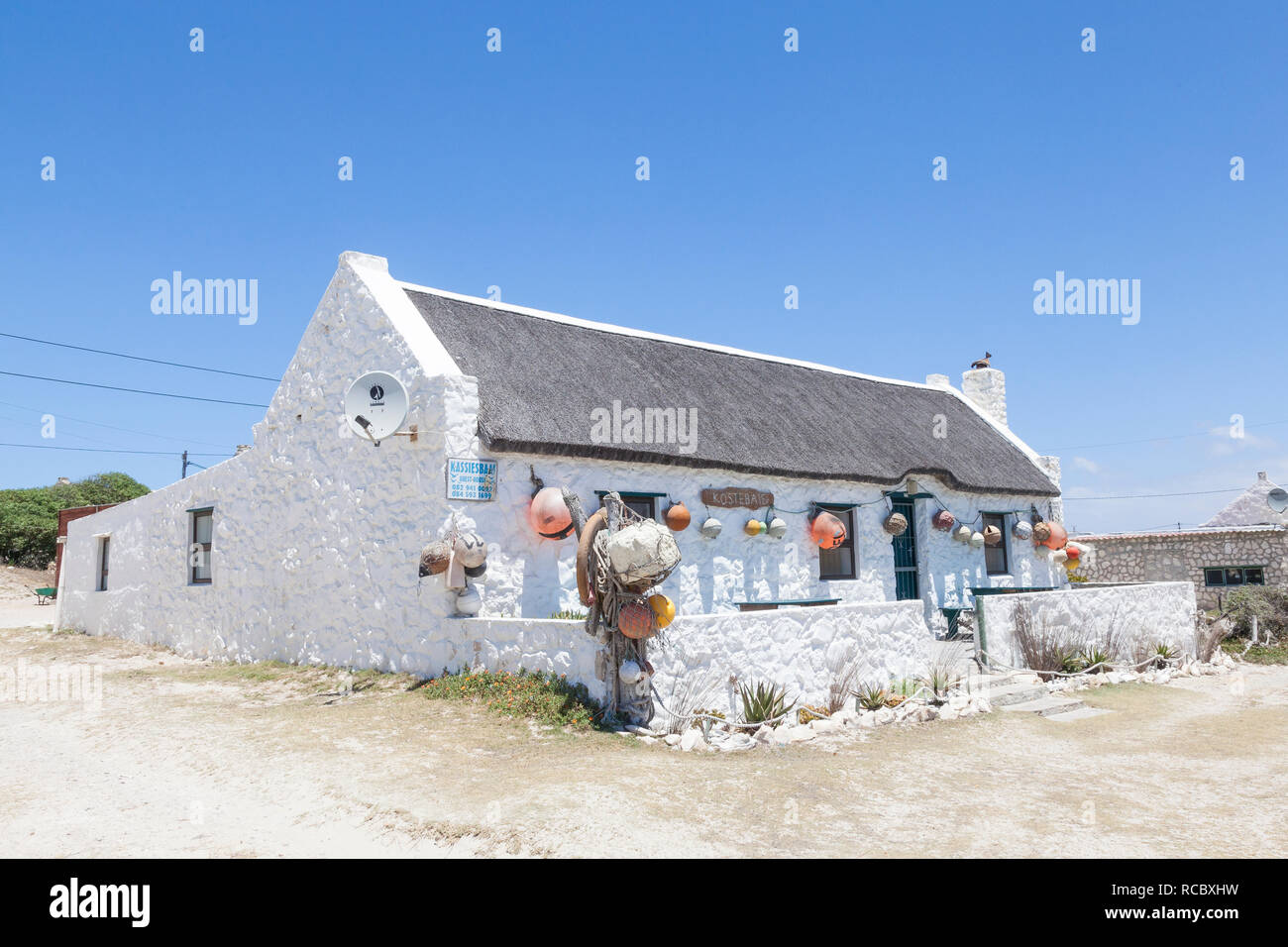 In einem umgebauten Fischer; s Cottage (Kostebaie - Kosten viel) und bietet touristische Unterkunft in der Ortschaft Arniston, Agulhas, Western Cape, South Afri Stockfoto